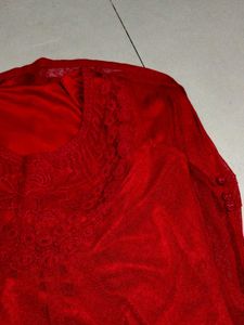 Red Sleeveless top.