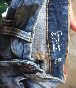 Ripped Blue Denim Jeans