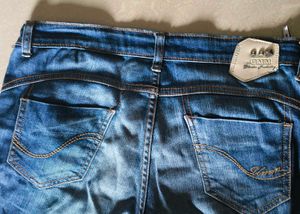 Distressed Denim Jeans