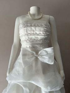 VOLUMINOUS RUFFLED ORGANZA WEDDING GOWN