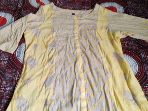 Beautiful Yellow Printed Kurti in Good Condition