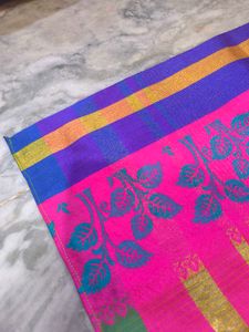 Green saree with multicolour details and glitter s