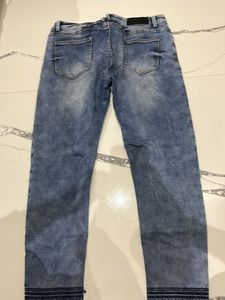 Mid Rise Blue Denim Jeans