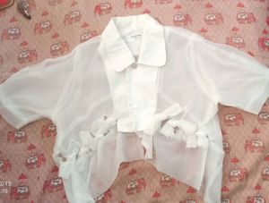 white, semi-sheer, short-sleeved blouse or top