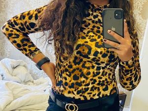 A Leopard Print Turtle Neck Fitted Top
