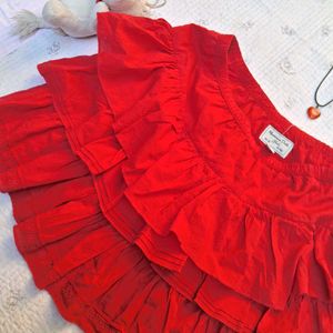 red ruffled short skirt