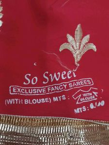 Elegant dark orange Embroidered Saree