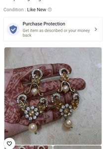 2 Pair Earings And A Neckpiece With Earing