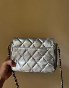Authentic Chanel Metallic Silver Mini Flap Bag