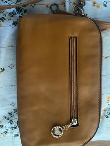 2 in 1, 5 compartment sling bag + pouch