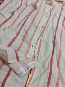 Stylish White Shorts with Bold Orange Lining – Spo