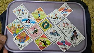14 RARE DIAMOND SHAPE SPORTS STAMPS