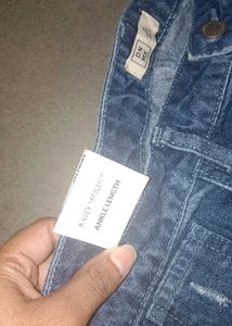 Distressed Blue Denim Jeans
