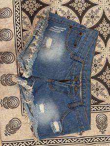 Distressed Denim Fringe Shorts