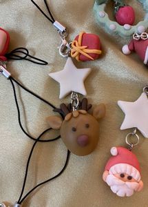 Reindeer With A Gift Charm