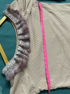 Tunic With Feather Detailing