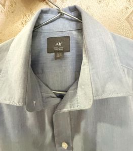 H&amp;M oversized light blue iron shirt