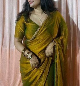 Trendy golden Saree with designer blouse