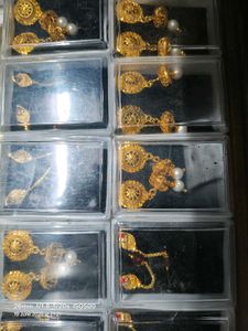 Gold Jhumka Earrings