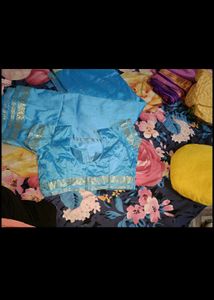 Woman Silk saree with stitched blouse