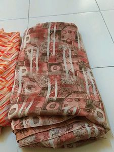 Elegant Orange Patterned Saree
