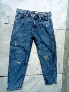 Ripped Blue Denim Jeans