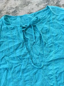Light blue low-cut neck top