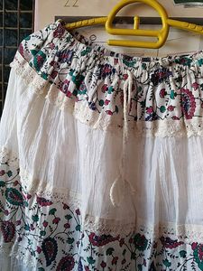 Beautiful  White Long Skirt With Printed Flowering Design Also With Lase