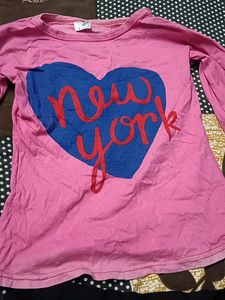 Pink Top And Black Shorts