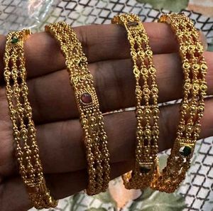4 bangles set golden color nd ✨️ multi clr me