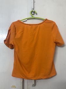 Orange Cold Shoulder Top From Myntra