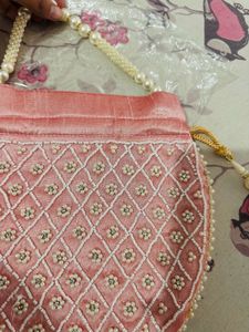 Regal Pink Pearl Potli Bag with Embellished Handle
