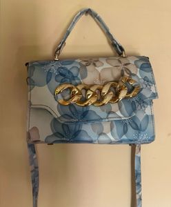FLORAL PRINT SLING BAG