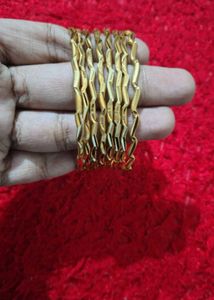 Gold Tone Bangles - Set of 7