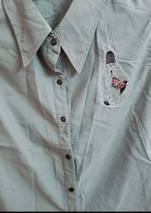 Sleeveless Button-Down