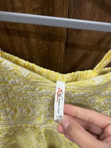 Yellow Embroidered Peplum Top