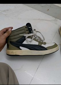 Stylish Puma high-top sneakers