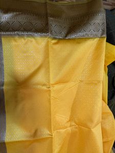 Elegant Yellow Art Silk Saree With A Classy Bangle