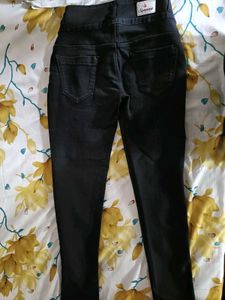 It Is Black Jeans With Tag And Solid  Colour