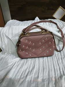Cute mauve satchel with gems