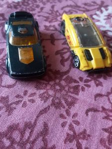 dark green and yellow original hotwheel cars