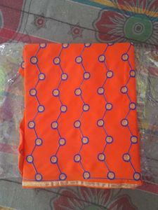 Orange Fabric with Geometric Circle Design