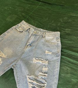 Ripped Light Wash Denim Jeans