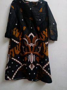 Beautiful Black Printed Kurthi With Golden Self Lines