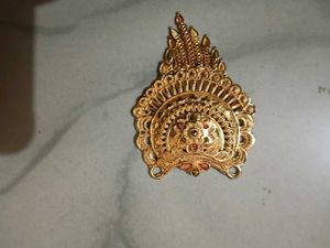 Gold Tone Pendant With Intricate Woven Texture