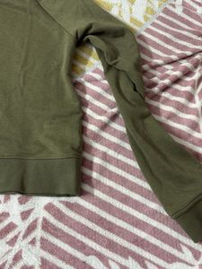 olive green sweatshirt + free gift