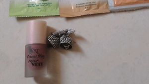 Set of earning nail polish and lip balm
