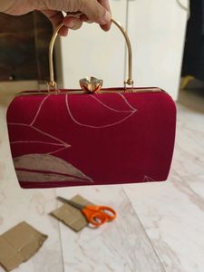 Maroon Printed Leaf Hand Clutch With Sling