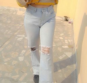 Distressed Light Wash Denim Jeans