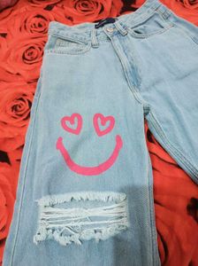 Ripped Jeans with Graffiti